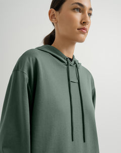 Buzo en algodón sostenible holgado con capucha verde para mujer