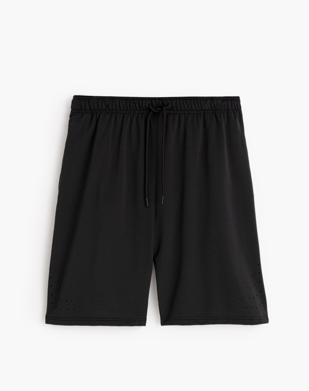 Pantaloneta deportiva con malla interna negra hombre