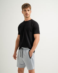 Pantaloneta deportiva control humedad gris para hombre