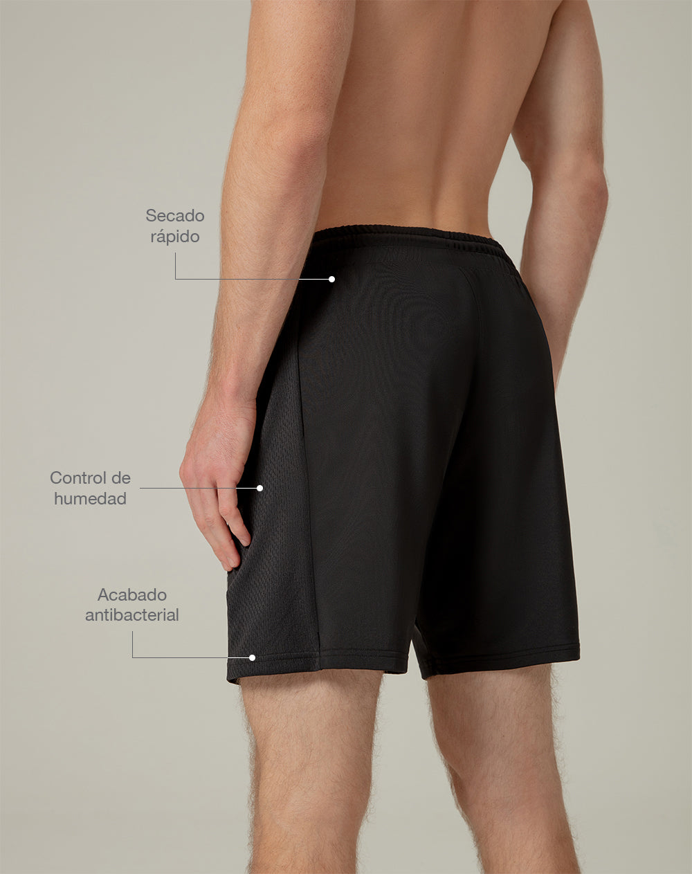 Pantaloneta deportiva control humedad negra hombre