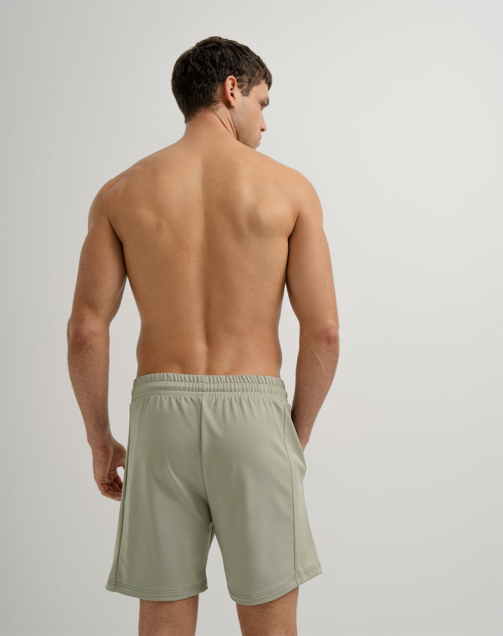 Pantaloneta deportiva control humedad verde para hombre