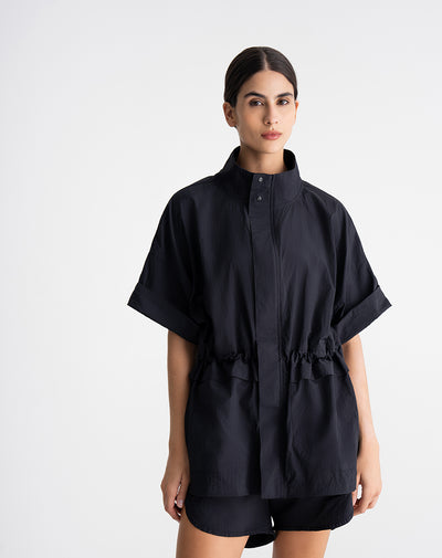 Chaleco rompevientos ajustable en cintura negro mujer