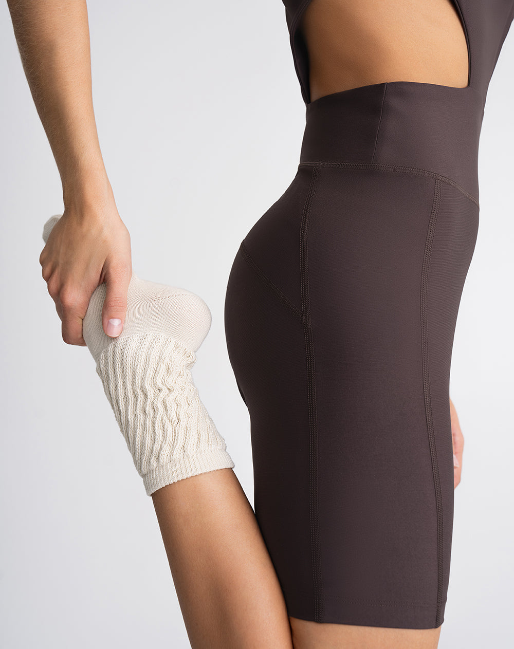 Enterizo deportivo control humedad café mujer