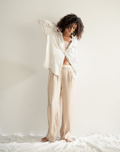 Pantalón relaxed fit tiro alto dorado lurex