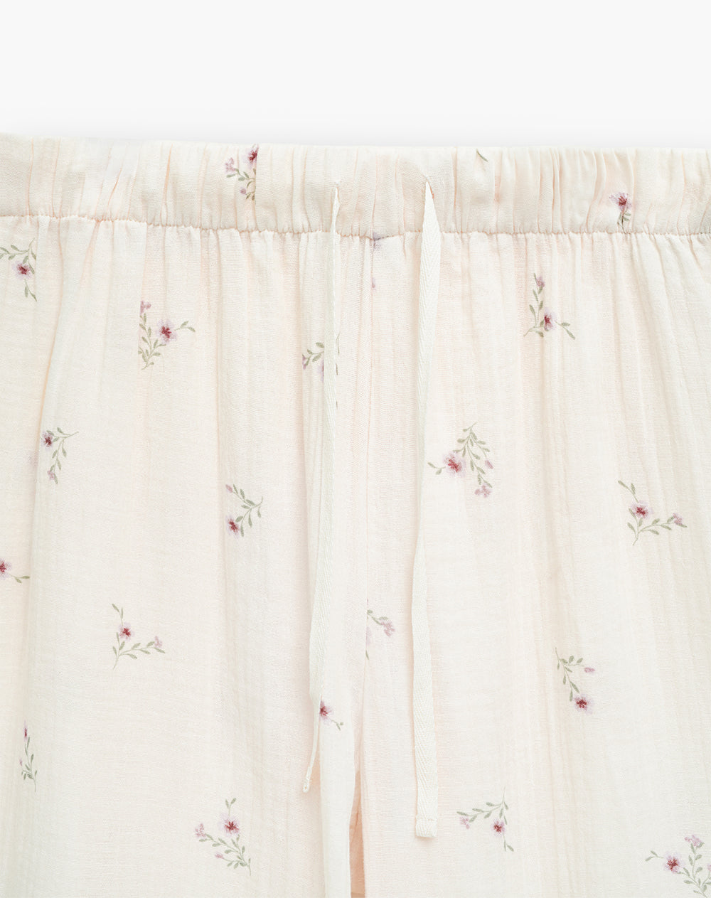 Pantalón relaxed fit tiro medio avena estampado