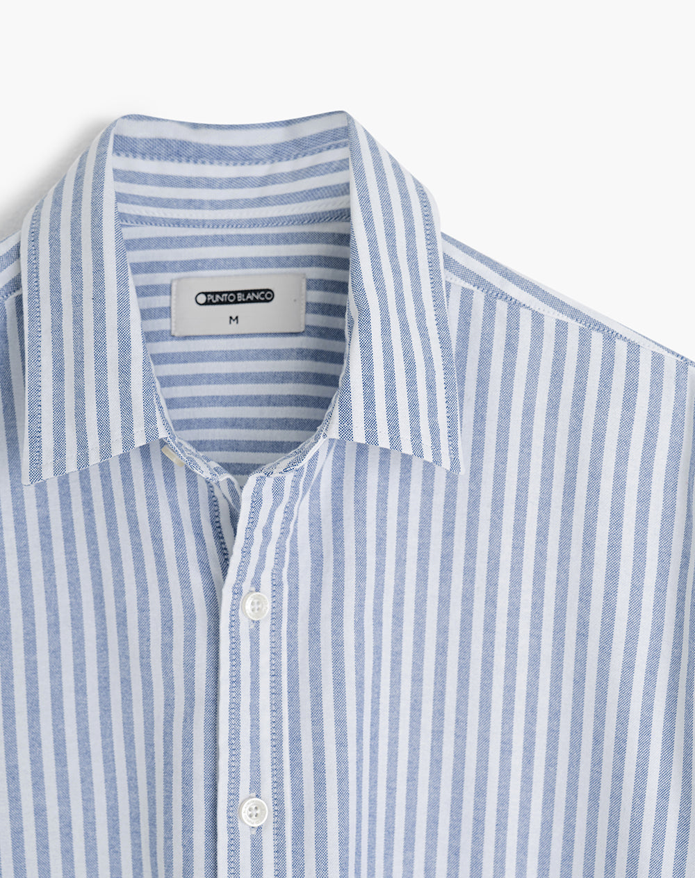 Camisa regular fit manga larga azul con rayas