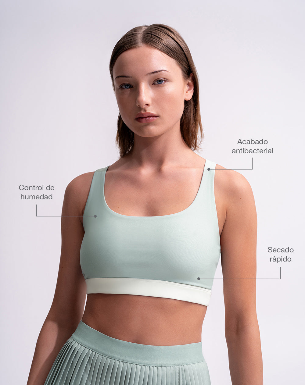 Top deportivo soporte medio control humedad verde