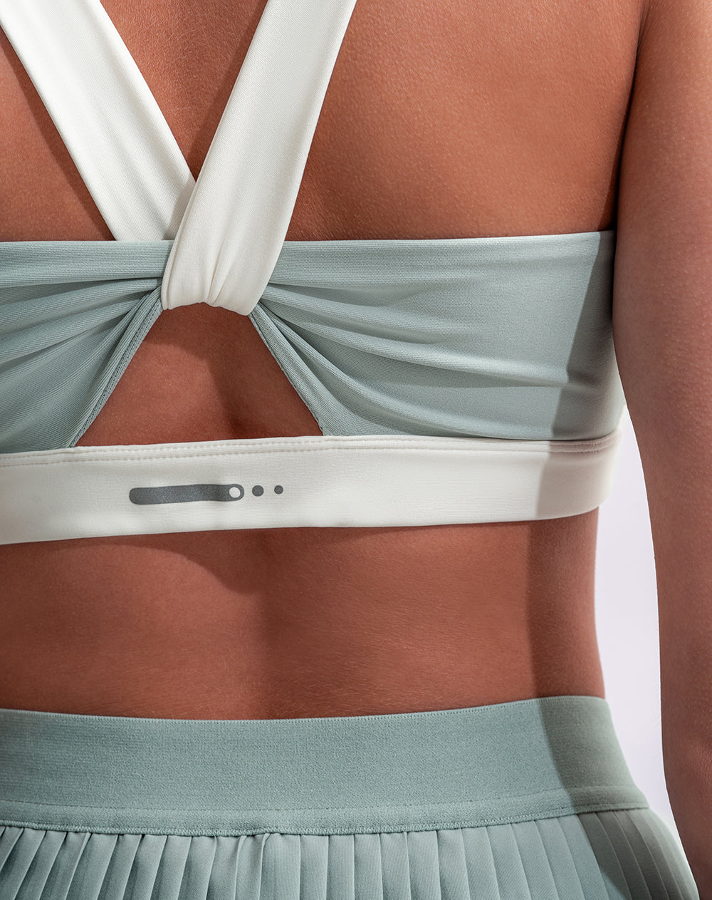 Top deportivo soporte medio control humedad verde