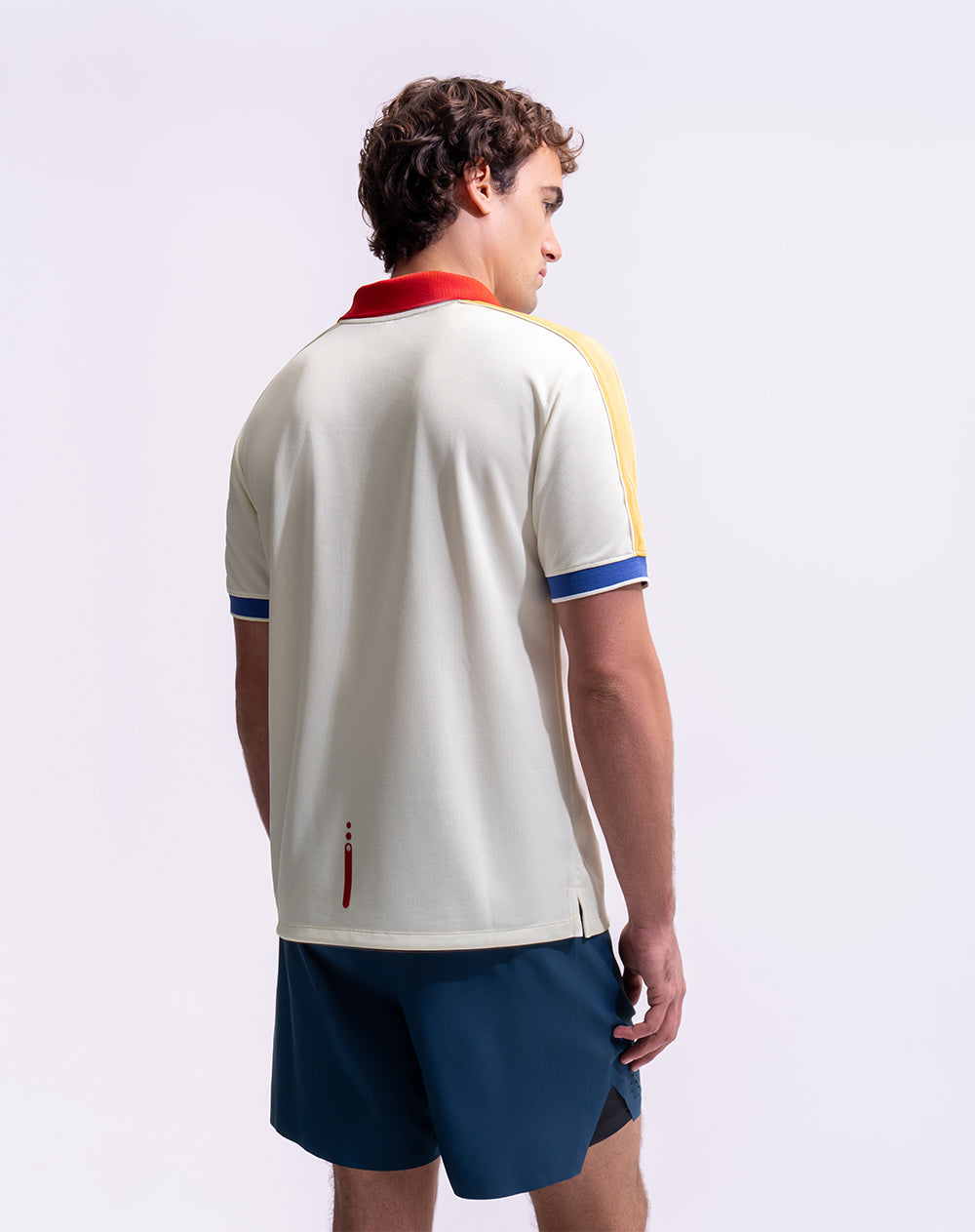Camiseta tipo polo regular control de humedad mundial unisex