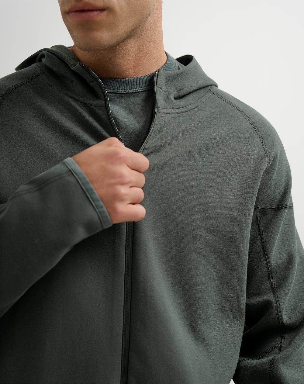 Chaqueta en algodón sostenible con cierre y capucha verde oscuro hombre