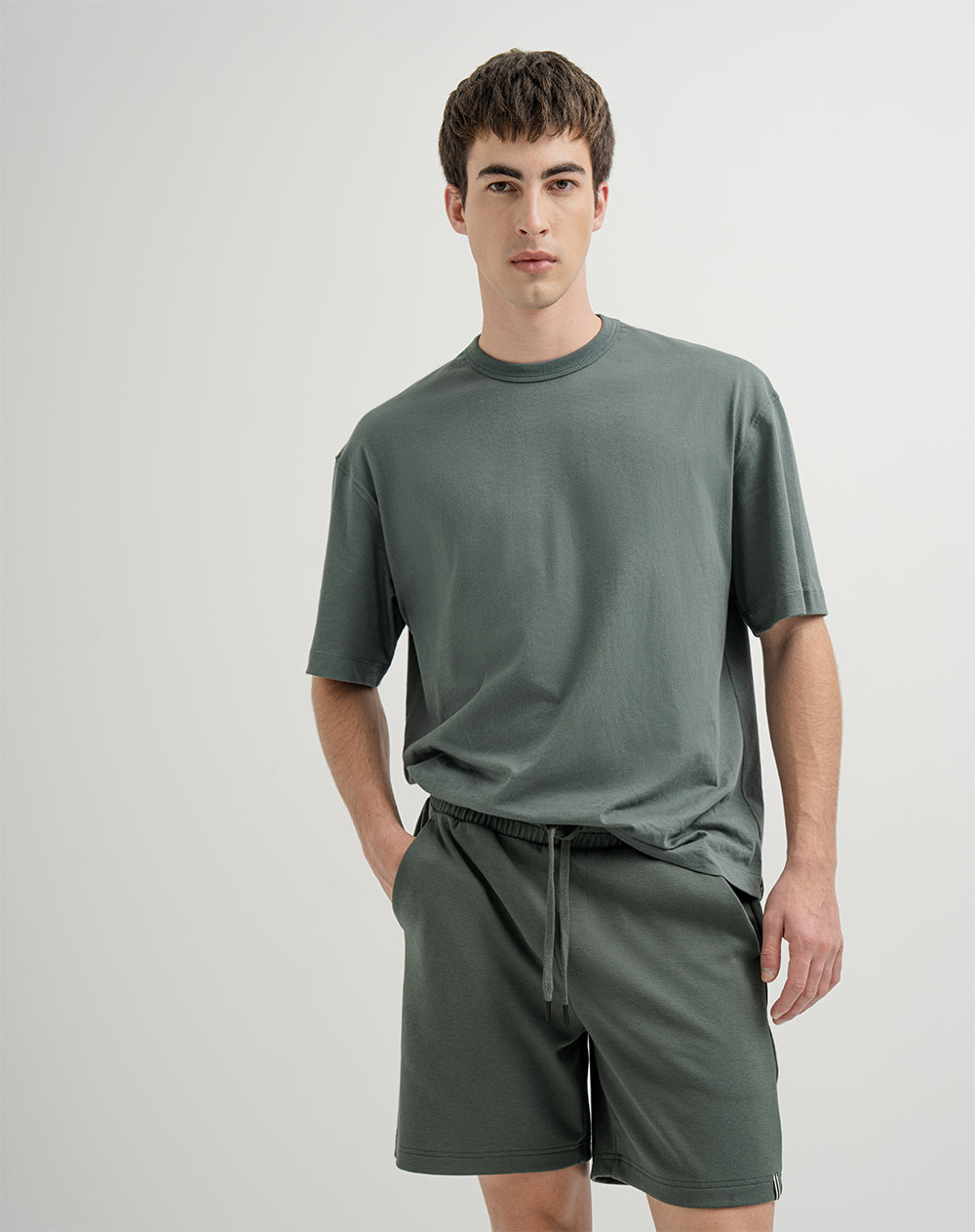 Bermuda algodón sostenible semi ajustada verde para hombre