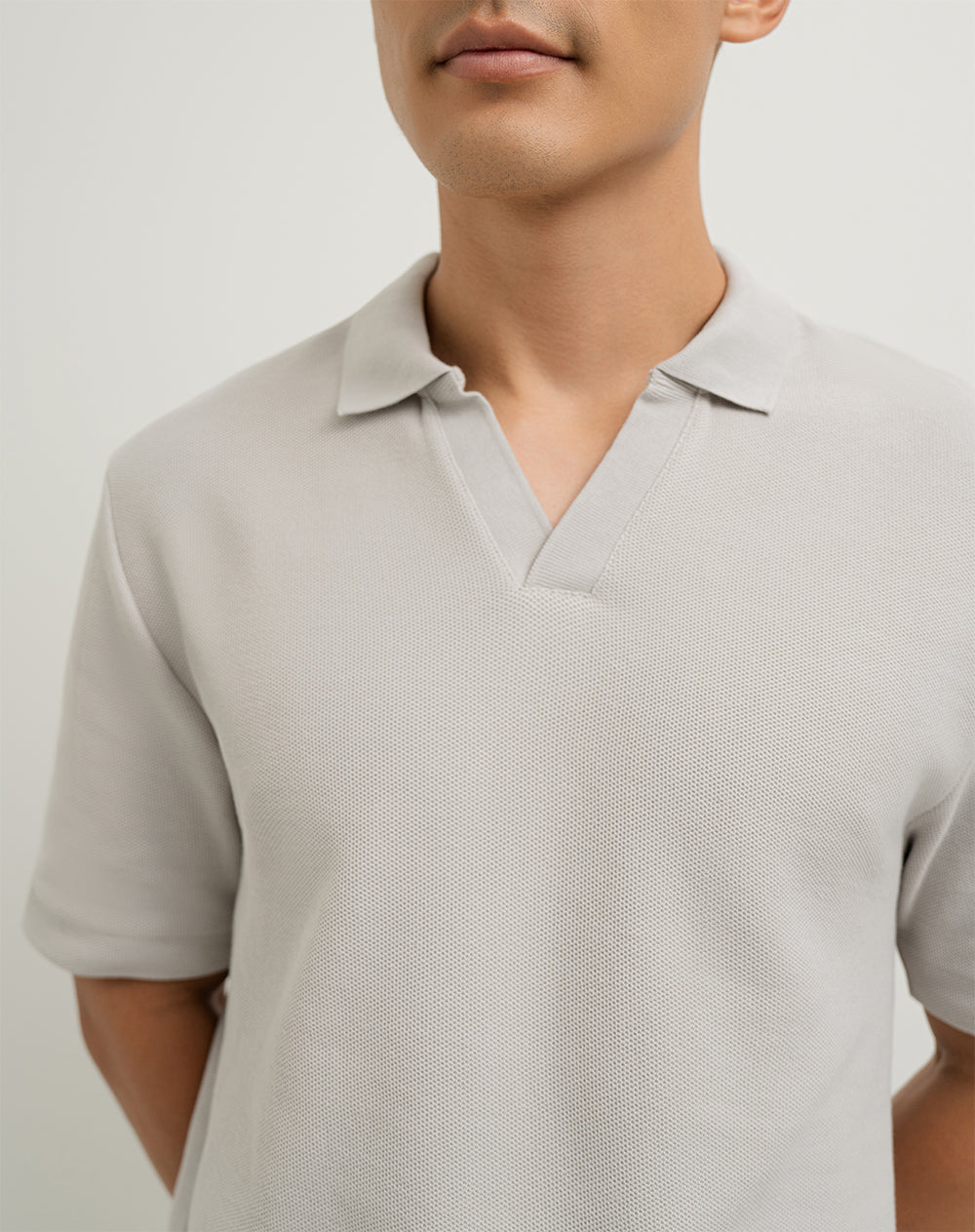Polo regular fit tela con textura habana