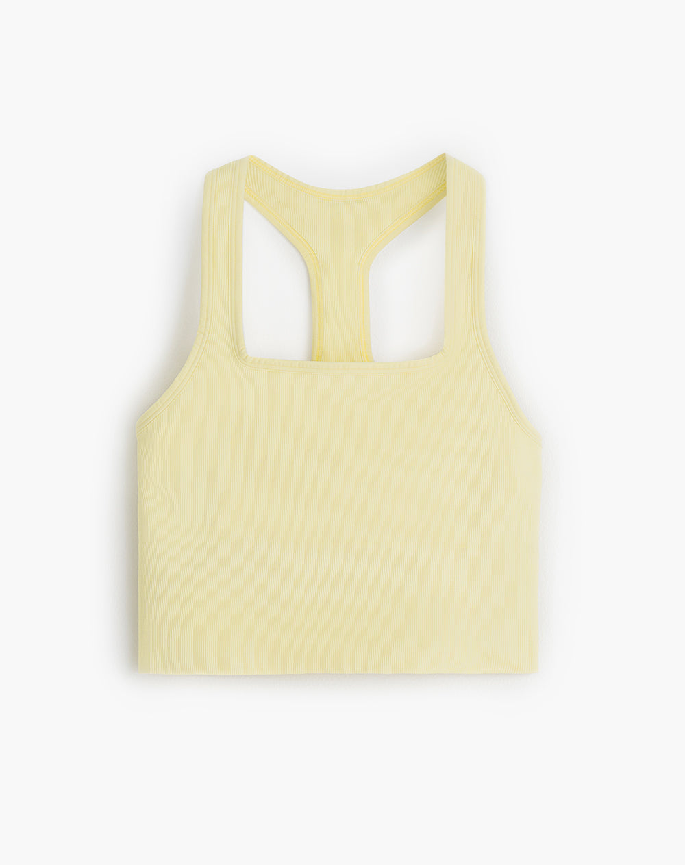 Crop top deportivo soporte alto seamless antibacterial amarillo