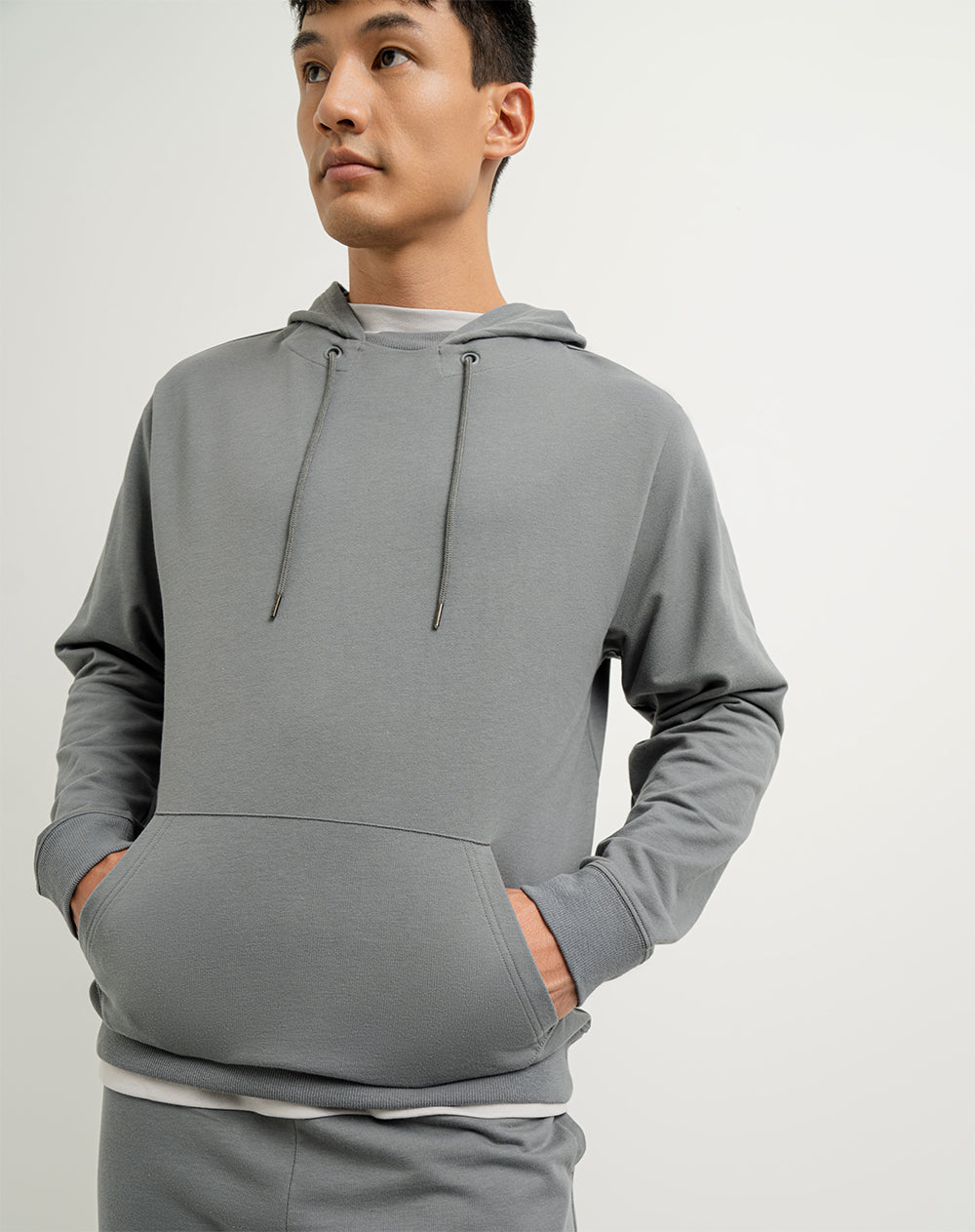 Buzo en algodón sostenible bolsillo frontal y capucha gris para hombre