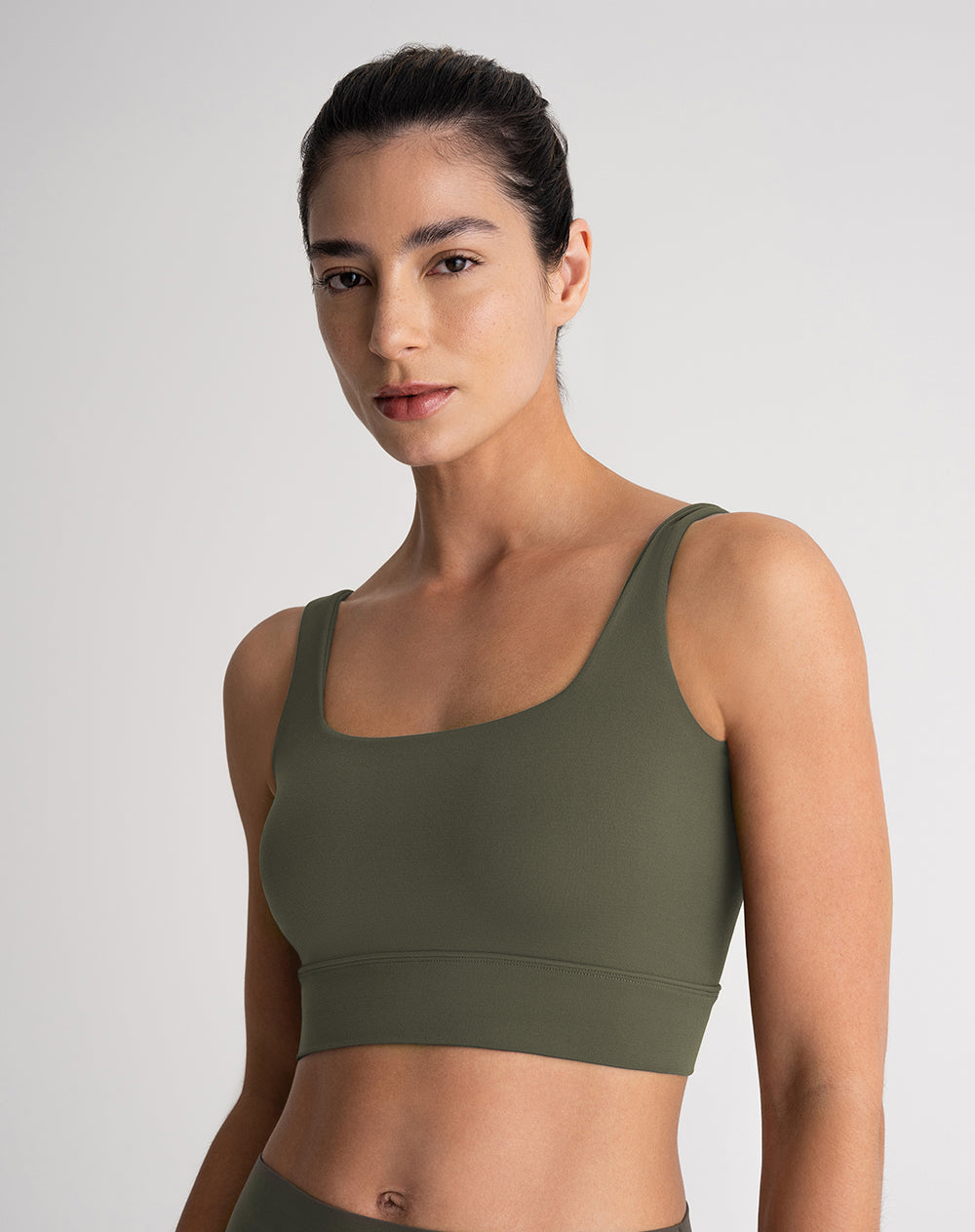 Top deportivo soporte medio seamless antibacterial verde