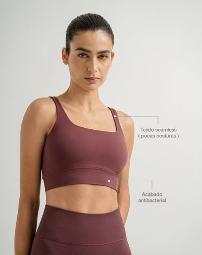 Top deportivo soporte medio seamless vino tinto