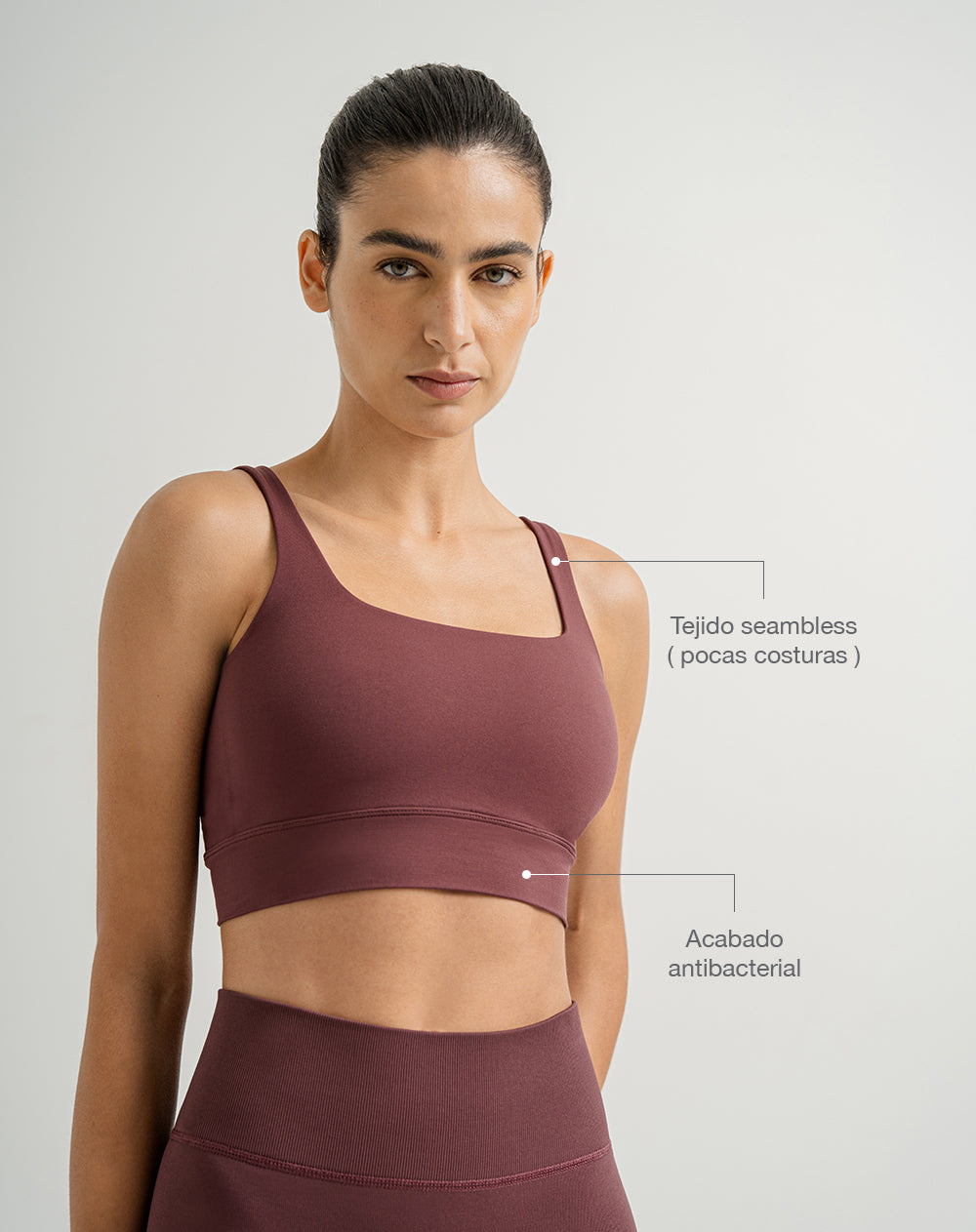 Top deportivo soporte medio seamless antibacterial vinotinto