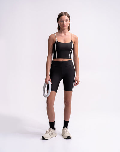 Biker deportivo tiro alto control humedad negro mujer