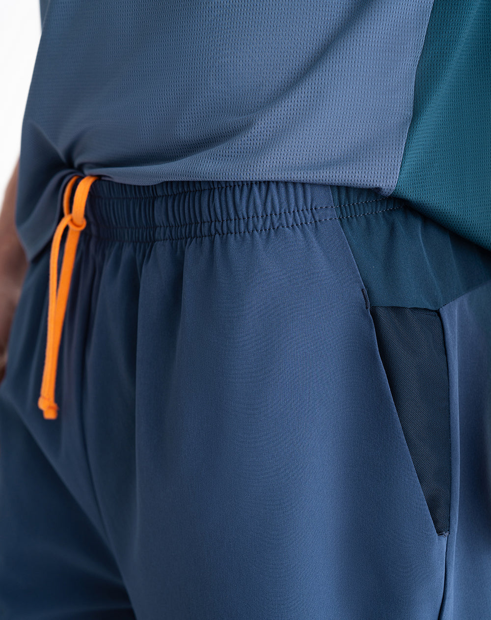 Pantaloneta deportiva malla interna azul hombre