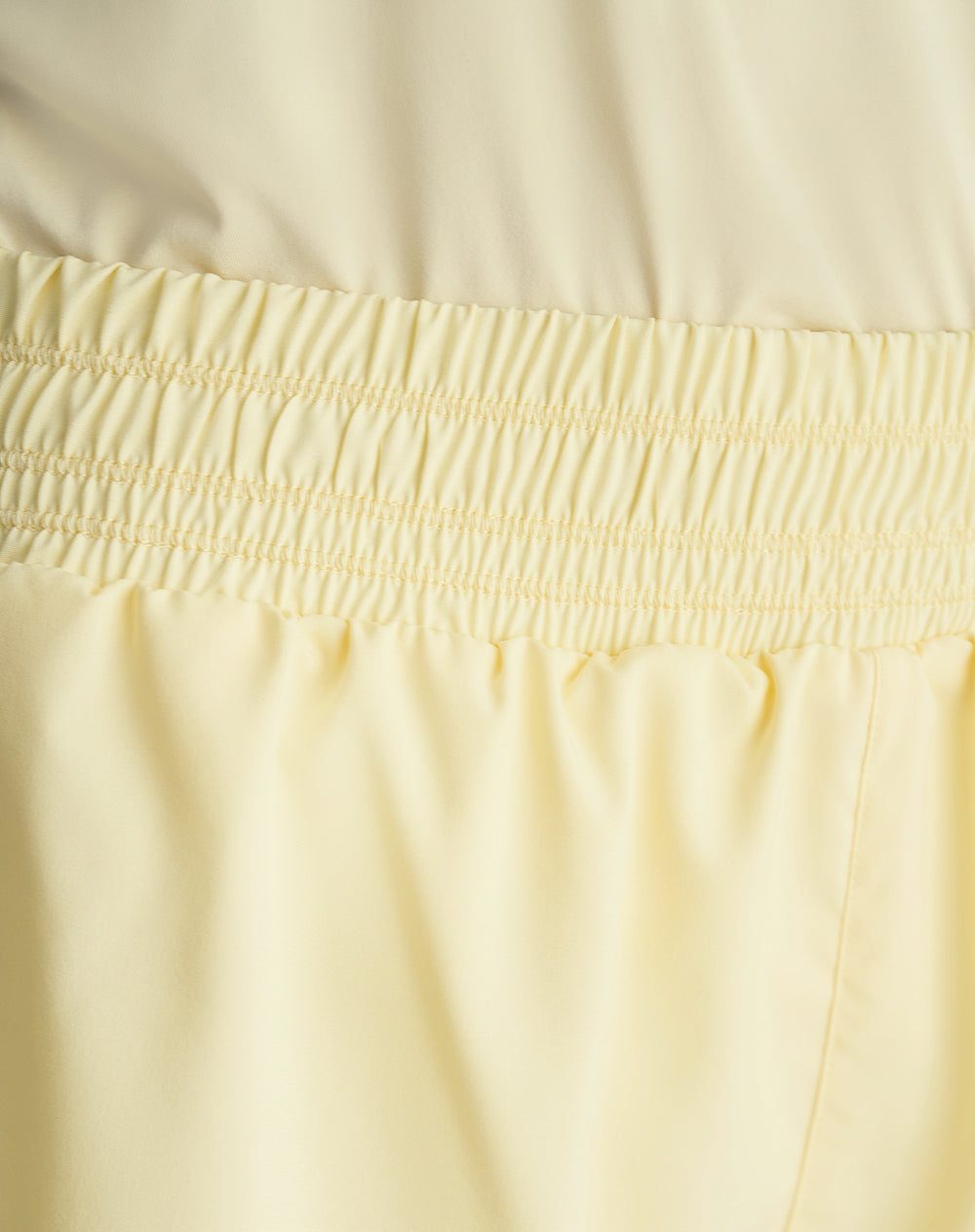 Short deportivo ciclista interno amarillo mujer