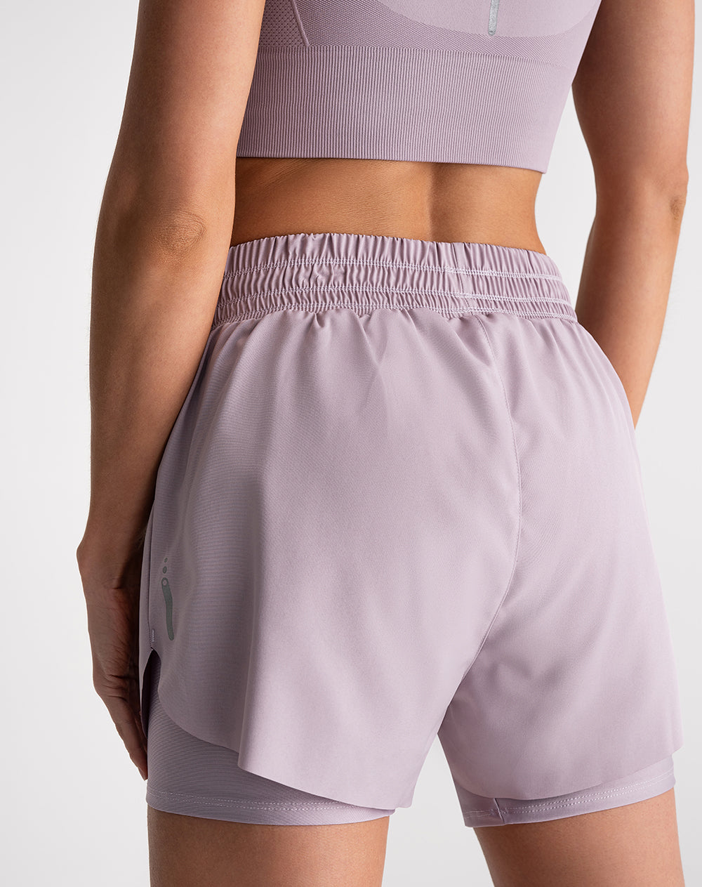 Short deportivo ciclista interno morado mujer