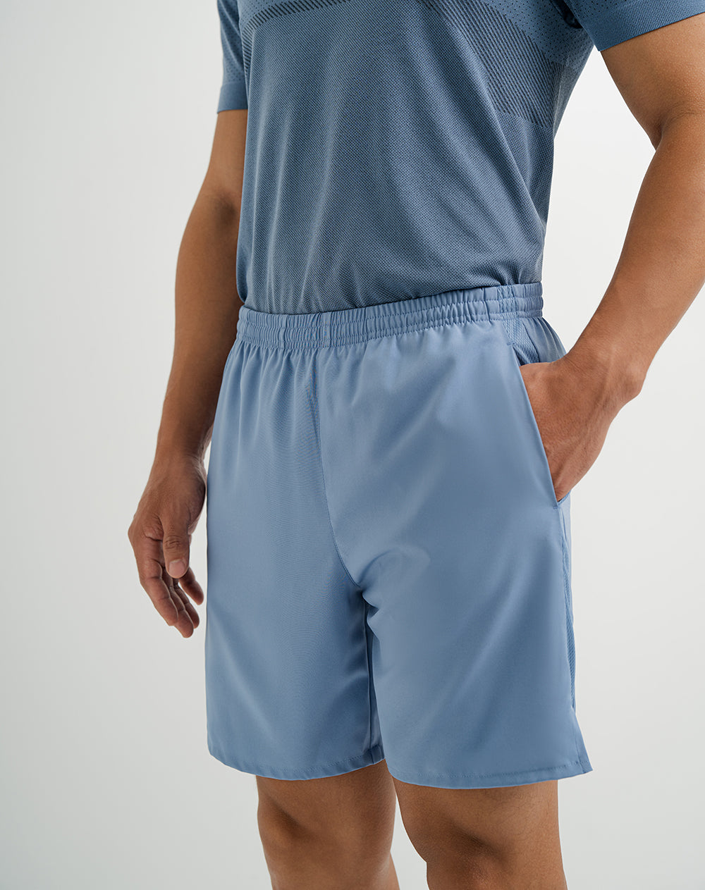 Pantaloneta deportiva con malla interna azul para hombre