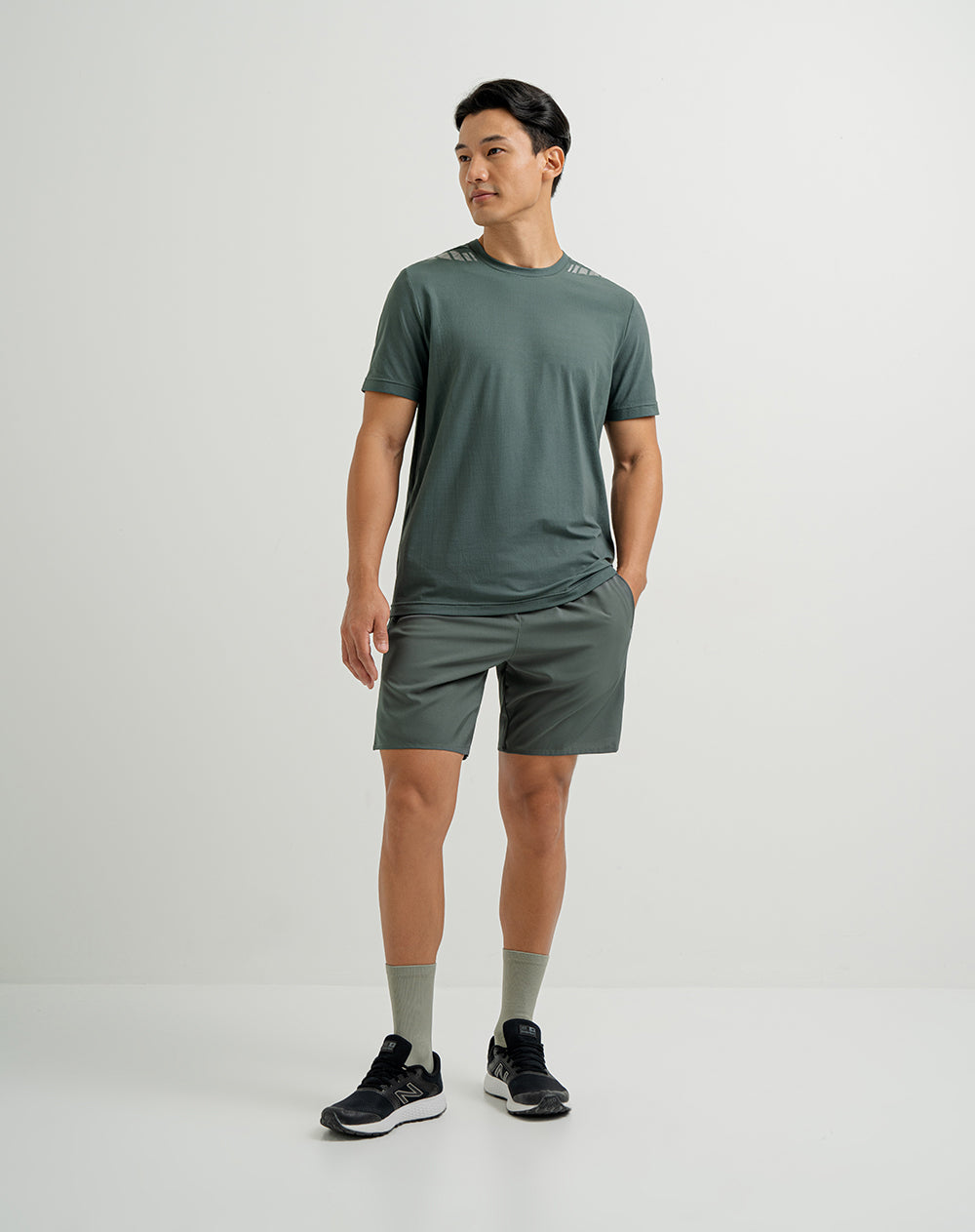 Pantaloneta deportiva secado rápido verde hombre